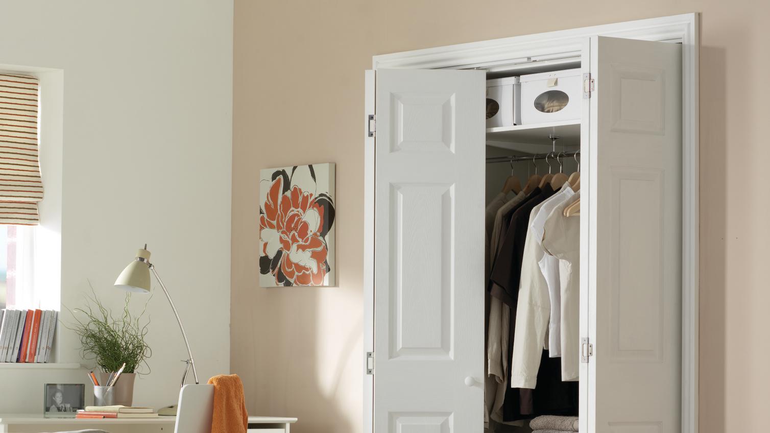 Pair of 6 panel bi-fold wardrobe doors, painted white