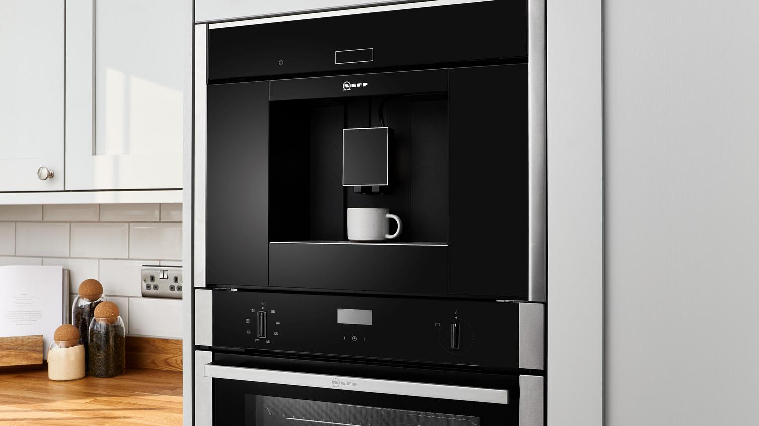 An inbuilt coffee machine and oven