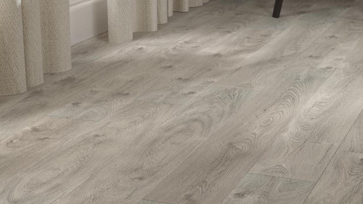 Rustic wooden flooring in a light grey tone