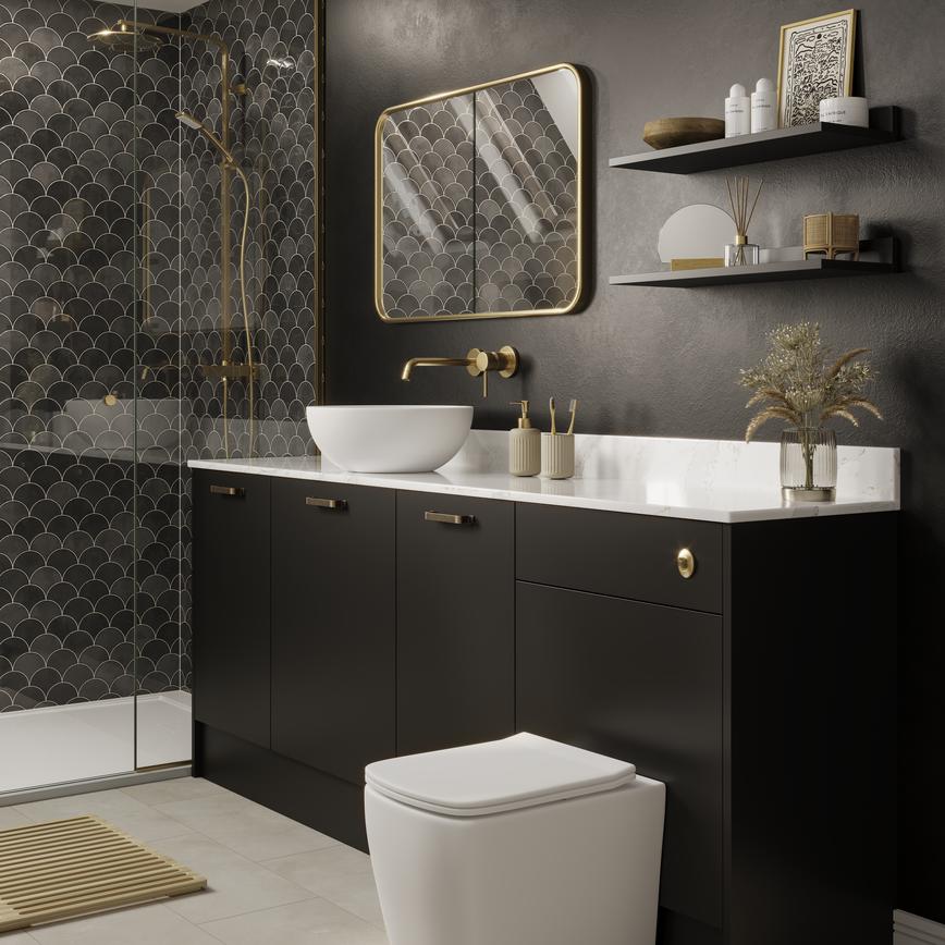 A Hockley black bathroom with a toilet, sink, and shower. A white worktop sits on top of black vanity cabinets and cistern unit.