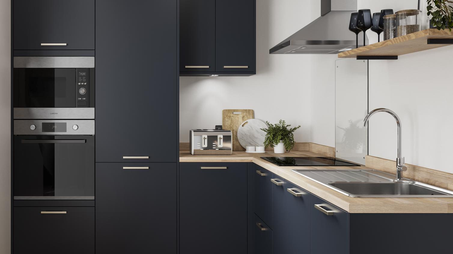A compact blue kitchen idea in an L-shaped layout. Has a tower unit, with a built-in oven and microwave, and wood flooring.