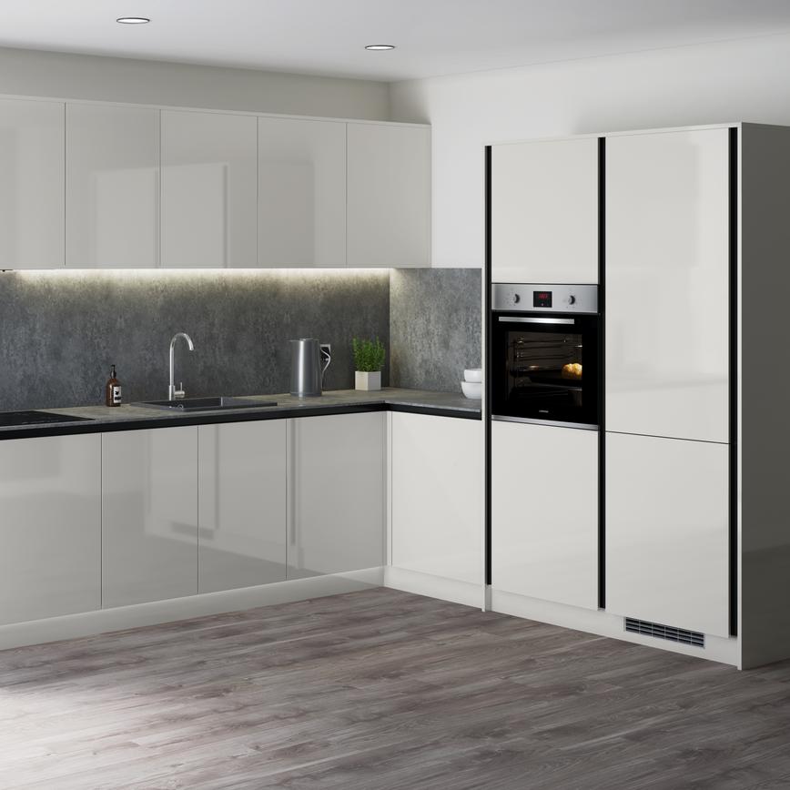 Modern grey gloss kitchen with industrial look grey worktop, matching splashback in an l shape with full height wall units.