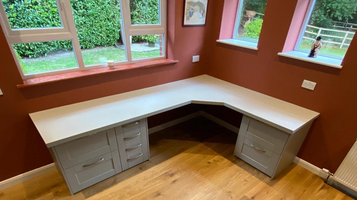 Home office desk from @aspectshome using Fairford Pebble grey kitchen cabinets and d-shaped bar handles in silver.