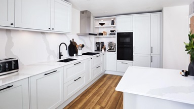 Millie Bright's white peninsula kitchen