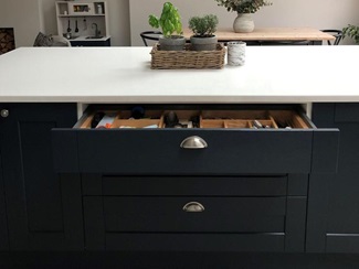Cutlery drawer open on navy island
