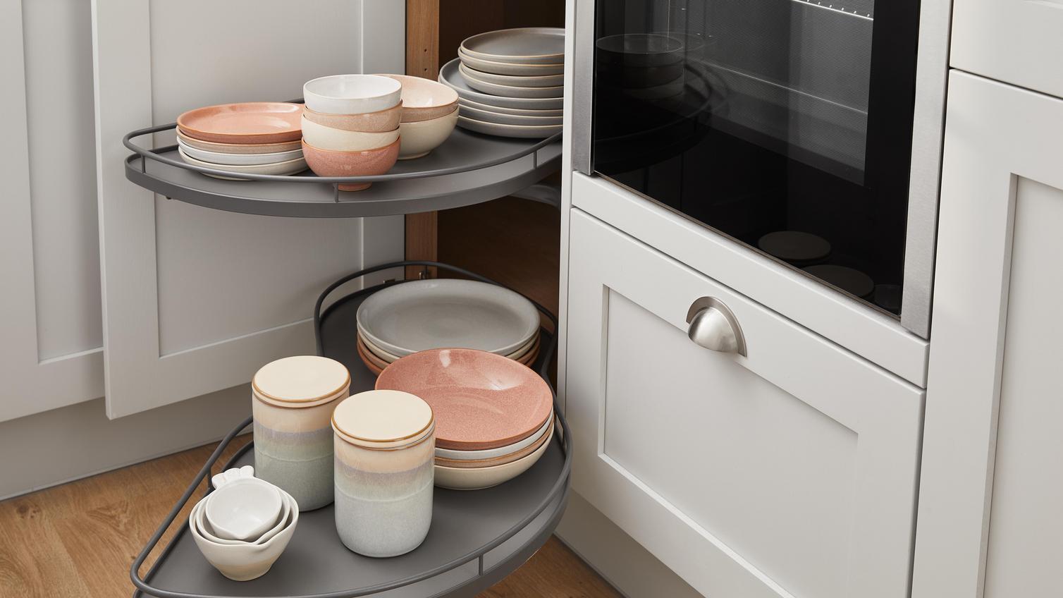 Ellen White's clever pull out corner storage options in a bright kitchen