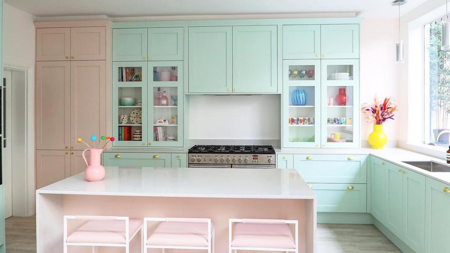 A pink and blue kitchen from Howdens