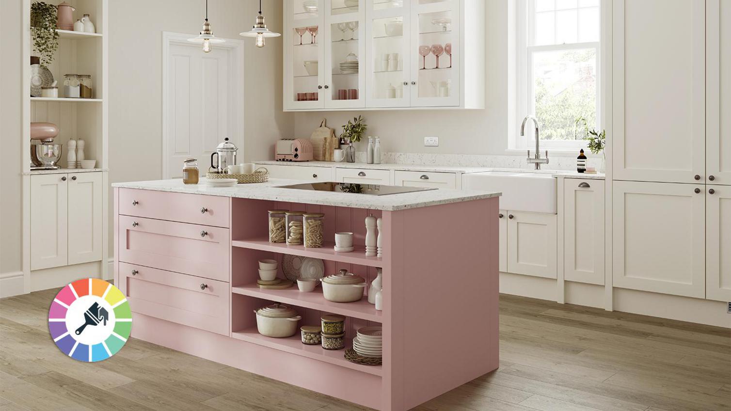 Pink and cream paintable kitchen idea with a contrasting pink island, shaker doors, a white quartz worktop, and open shelves.