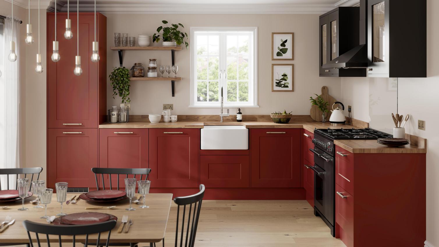 A paintable red kitchen idea using Chelford shaker cupboard doors in an l-shaped layout. Includes timber floors and worktops.