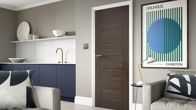 A walnut internal door in a modern living room