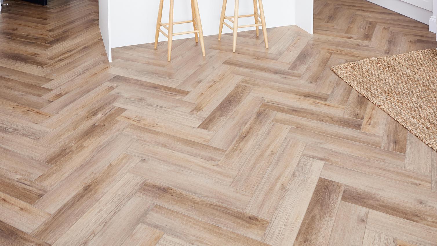 Wood-effect laminate flooring from Oake & Gray, a Howdens exclusive brand