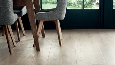 Durable engineered wooden flooring in a n open living and dining room
