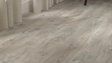 Rustic wooden flooring in a light grey tone