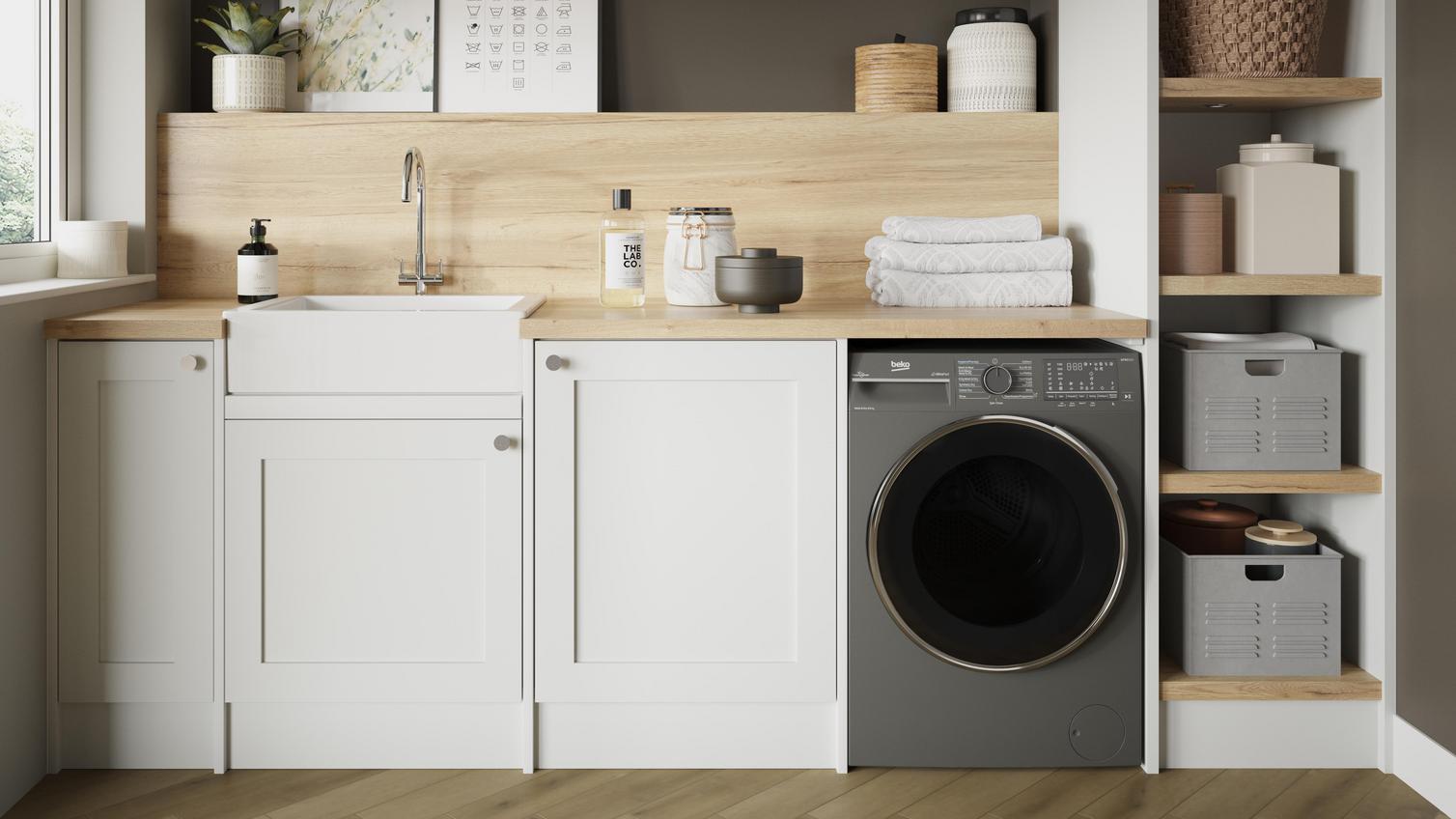 A washer dryer in a layered utility room comprised of white, grey, and timber.