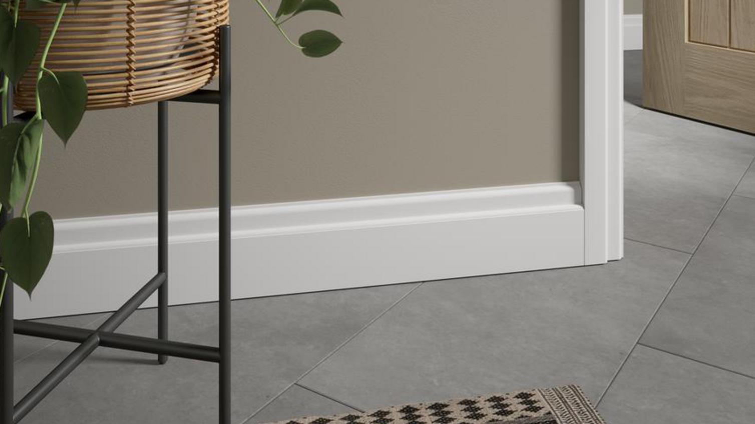 Simple timber skirting in a budget utility room.