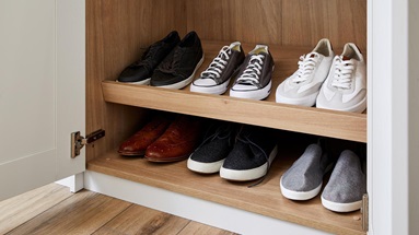 A full shoerack inside some bedroom storage from Howdens