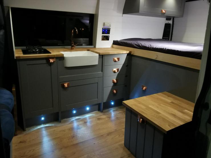 Greyham campervan Howdens kitchen makeover featuring plinth lighting at night