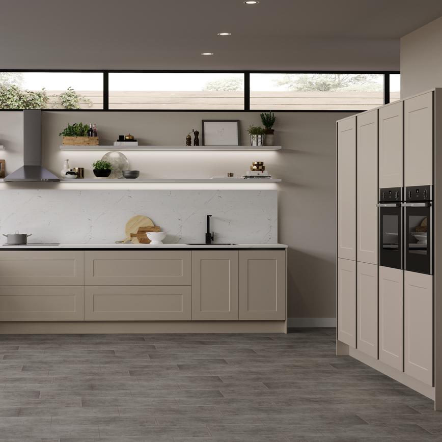 Contemporary pebble grey shaker kitchen with marble effect splashback and breakfast bar. Double height open wall shelves