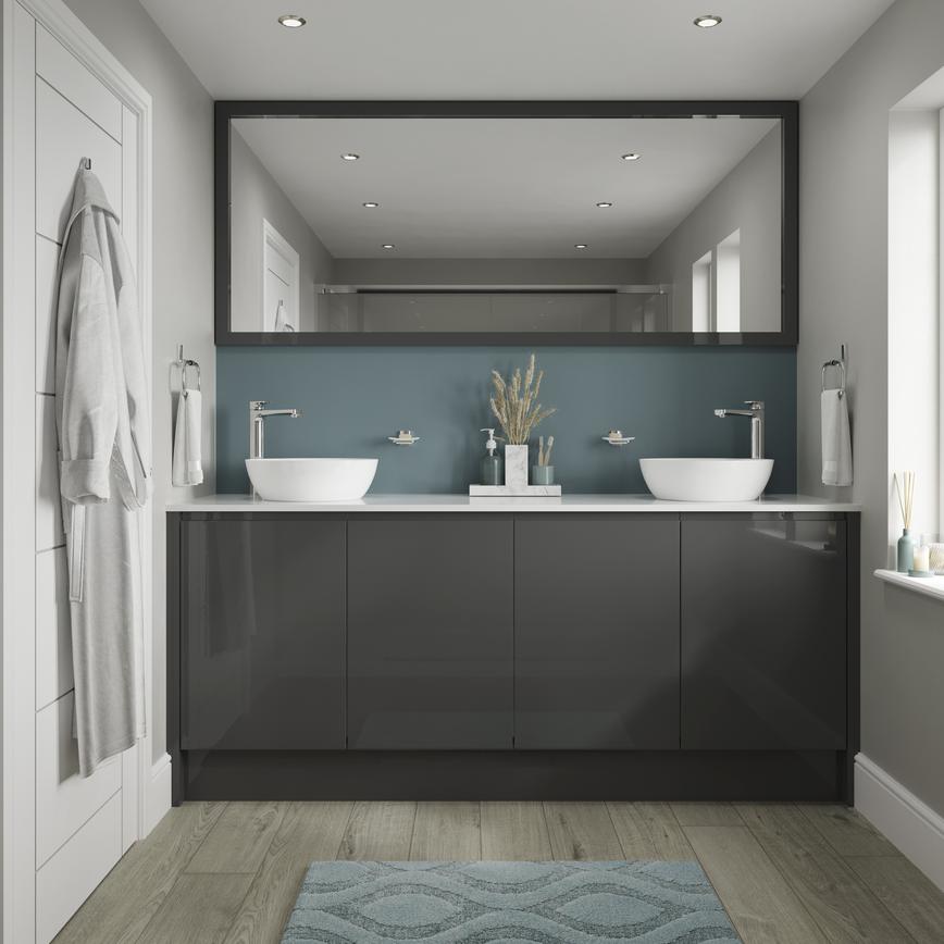 Charcoal bathroom with gloss cupboard doors. Includes a white square-edged worktop, two white basins, and silver lever taps.