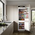 Samsung 70 30 Fridge Freezer Integrated Door Open Featuring Howdens Kitchen Clerkenwell Sand Grey
