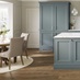 Quick-Step Amber Oak Luxury Rigid Vinyl Flooring with Integrated Underlayin an Elmbridge Laguna Blue In Frame Kitchen Set