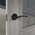 Holdenby Grey Laminate 2'3'' Glazed' Door and Garda Matt Black Handle Cameo