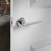 Auriga Polished Chrome Lever on Rose Door Handle Pair