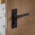 Munch Matt Black Lever on Backplate Bathroom Door Handle Pair