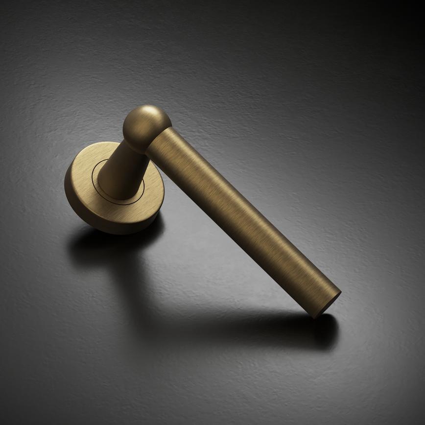 Fuller and Forge Como Antique Brass Lever on Rose Door Handle Pair