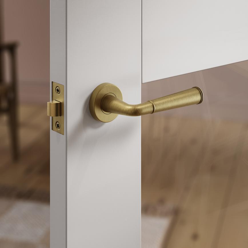 Fuller and Forge Arno Antique Brass Lever on Rose Door Handle Pair Situational Image