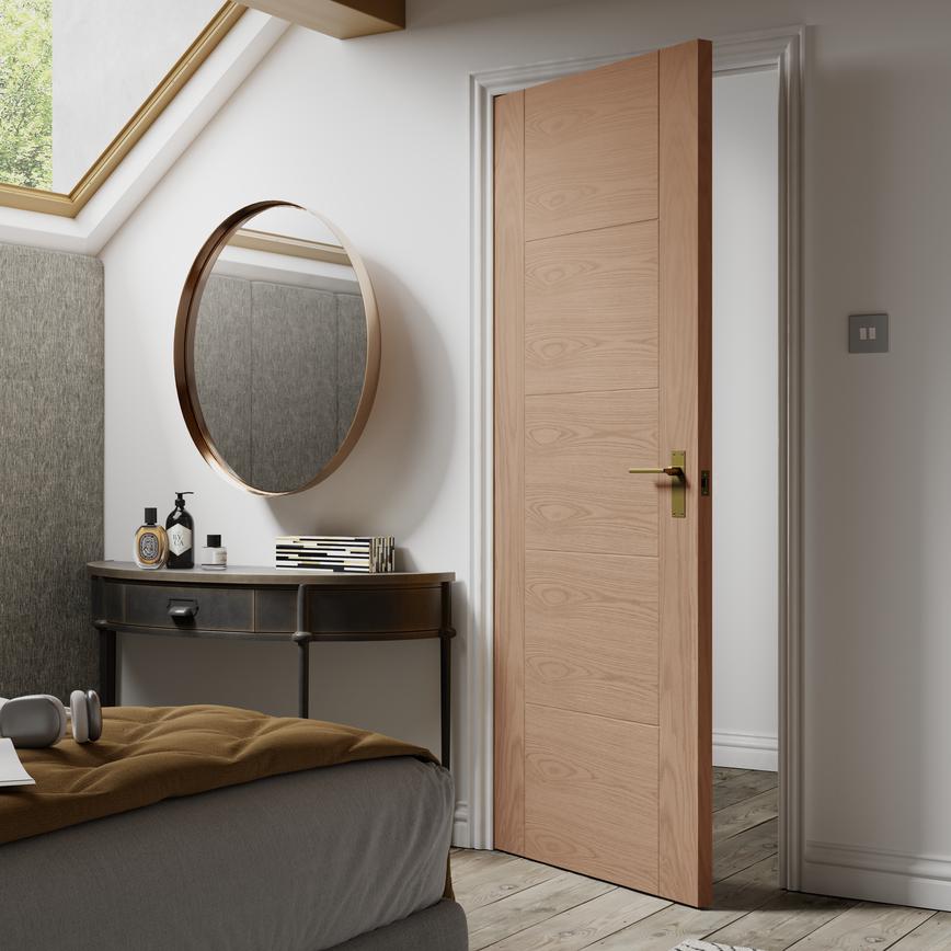 Much Antique Brass Lever on Backplate Handle on a Daytona Oak Door