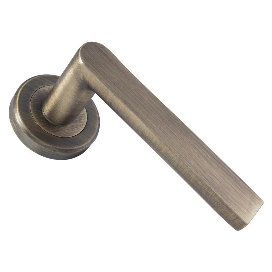 Carlisle Brass Serozzetta Edge Antique Brass Fire Rated Lever on Rose Pair