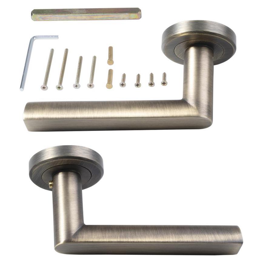 Carlisle Brass Serozzetta Edge Antique Brass Fire Rated Lever on Rose Pair