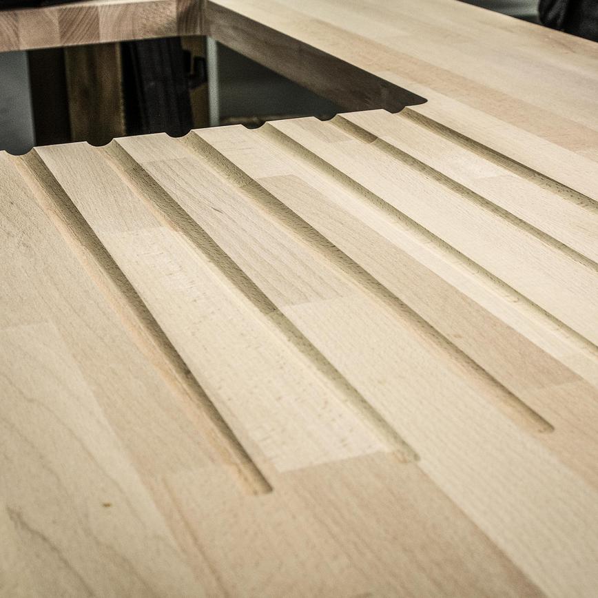 Trend Craft Pro 19.1mm x 32mm PTFE Coated Radius Draining Groove Router Cutter Angled View of Cut Grooves