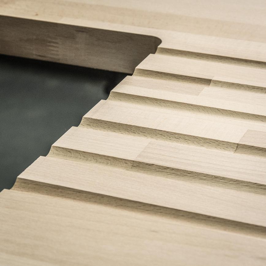 Trend Craft Pro 19.1mm x 32mm PTFE Coated Radius Draining Groove Router Cutter Close Up Angled View of Cut Grooves