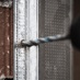 Bosch multi material drill bit drilling through metal and brick