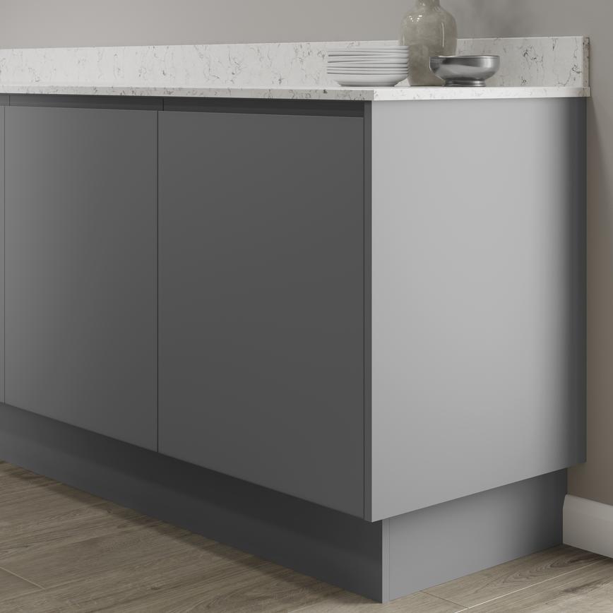 Matt slate grey 18mm MDF continuous plinth 3m fitted with base cabinet and white worktop