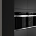 Super Matt Black Tower Decor End shown with Tower Cabinets containing appliances
