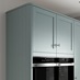 Grained Seafoam Tongue and Groove Tower Decor End Shown with Glass Dresser Cabinet