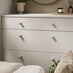 Beehive Brushed Nickel Smooth Cabinet Knobs on Wide Bedrooom Drawers