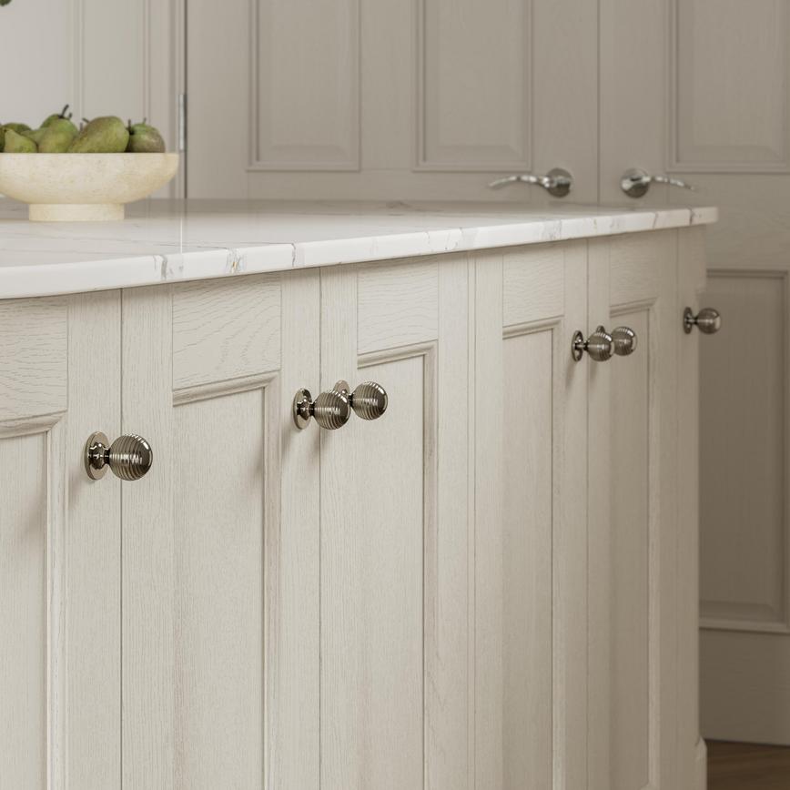 Beehive Polished Nickel Cabinet Knob on Bank of Kitchen Drawers