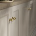 Beehive Satin Brass Smooth Cabinet Knob on Kitchen Doors
