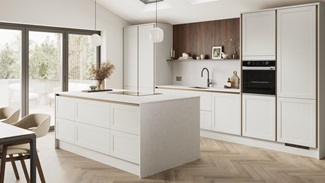 A white kitchen island layout, with handleless shaker doors, metallic profile trim, and herringbone wood-effect flooring.