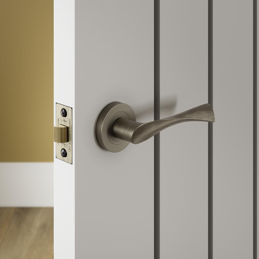 Sofia Antique Brass Lever on Rose Door Handle Pair