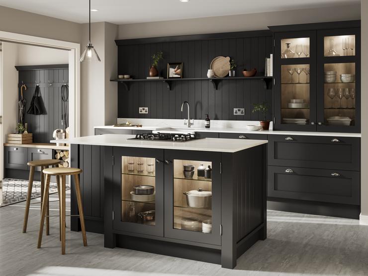 Black shaker kitchen island with matching wall panels and glass cabinets. Includes white worktops for a two-tone look.