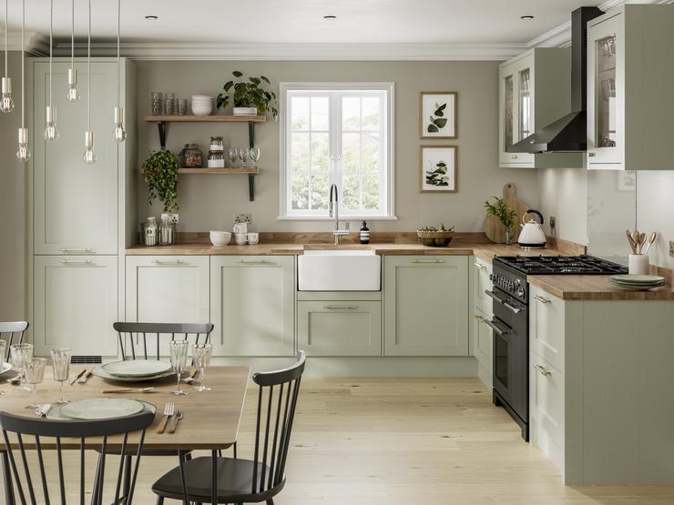 A shaker kitchen extension idea with a space for family dining using slate-grey, solid timber doors and wooden worktops