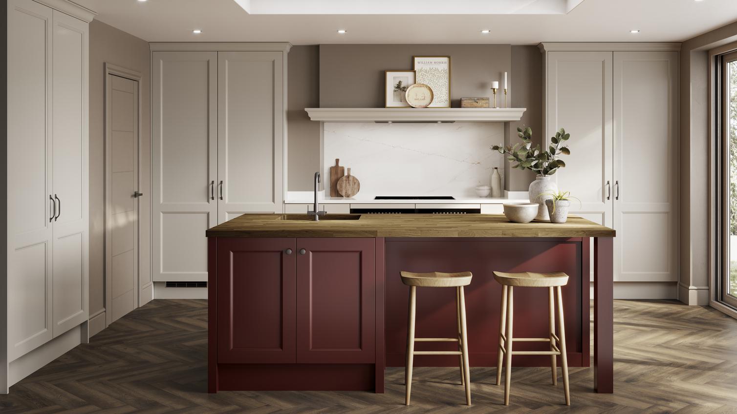 Cream shaker kitchen in an L-shaped layout, with garnet red island and chevron floors. The island has a wood-effect worktop. 