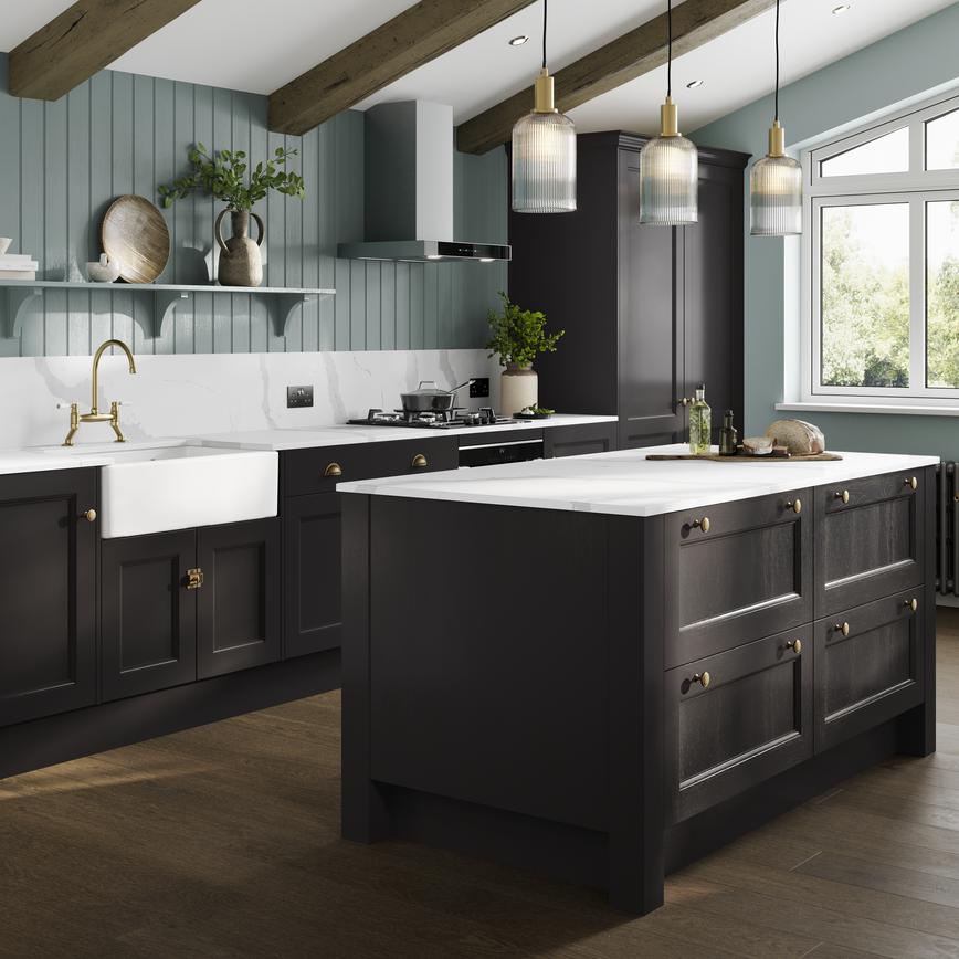 A black shaker kitchen in an L-shaped layout with a dusk blue island. There are black worktops and dark oak flooring. 