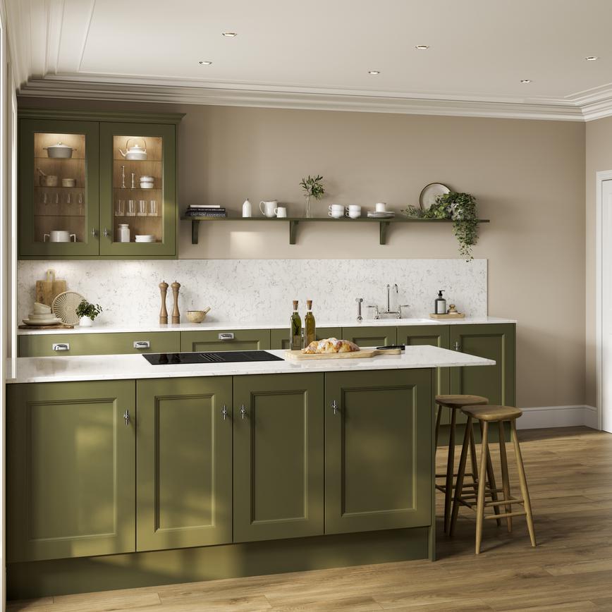 An olive-toned, dark green kitchen in a shaker design. There is a kitchen island, white worktop, and matching upstand.