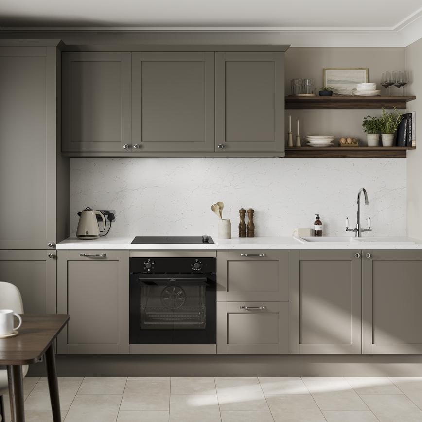 A grey kitchen in a shaker, single-wall layout. It includes grey tile flooring, white worktop, and a matching splashback.